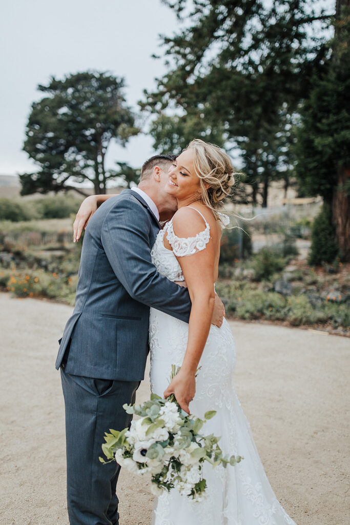 West Event Co | Sonoma County Wedding Planner | groom kissing the bride 